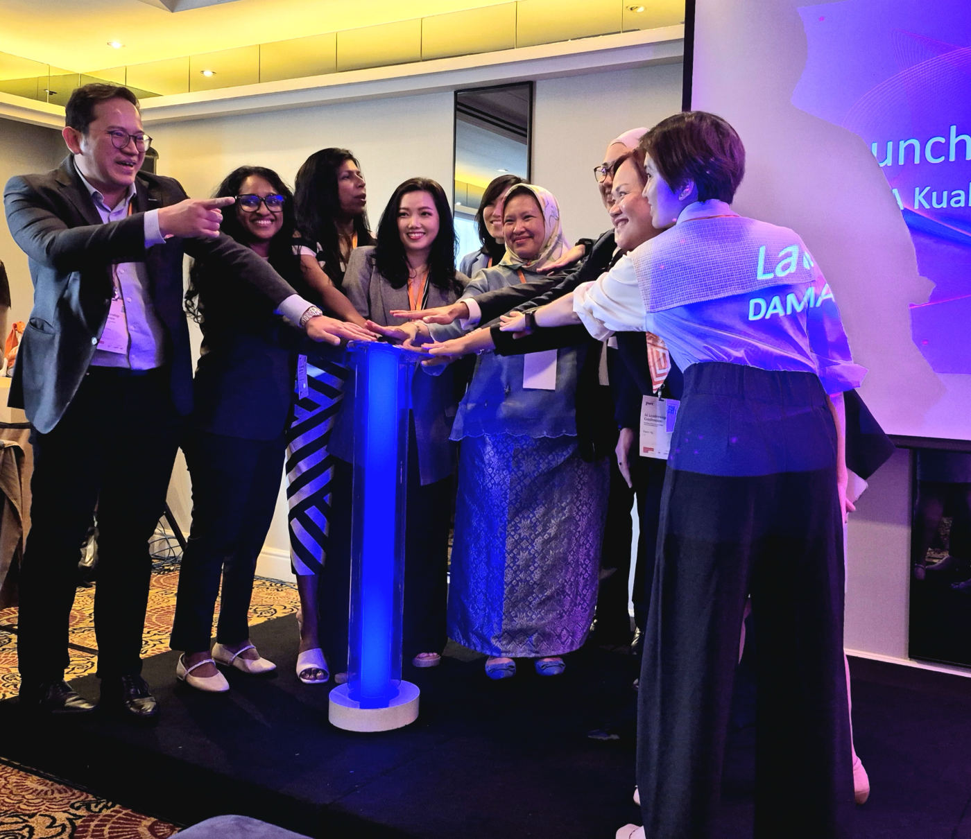 Board members pressing the launch button at the official launch